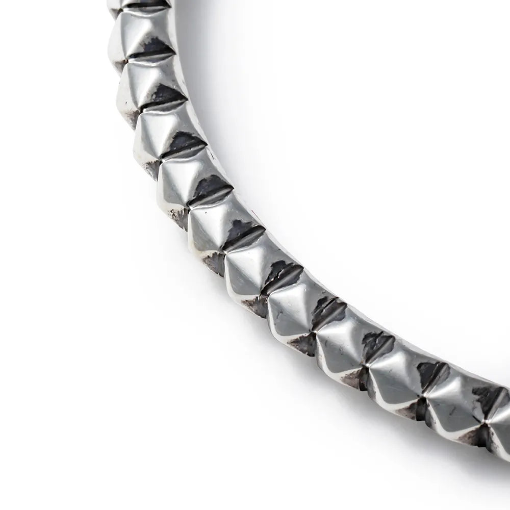 SURROUND STUDS BANGLE